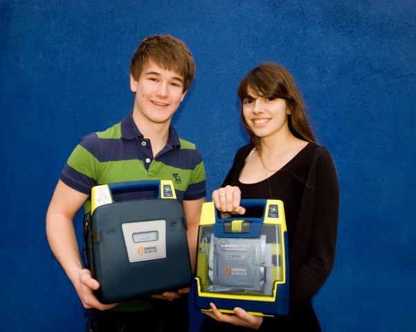 St Paul\'s Head Boy and Girl with Defibrillators for St Paul\'s Catholic College and Downlands School